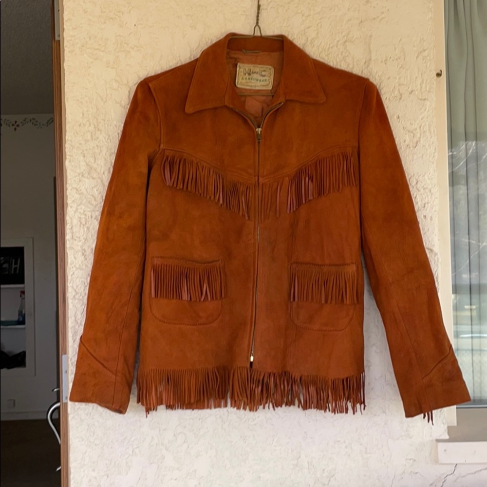 Orange leather H Bar C Ranchwear jacket.